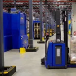 Global AGV automated guided vehicle lifting a pallet